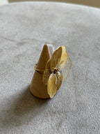 Anillo flor brillo