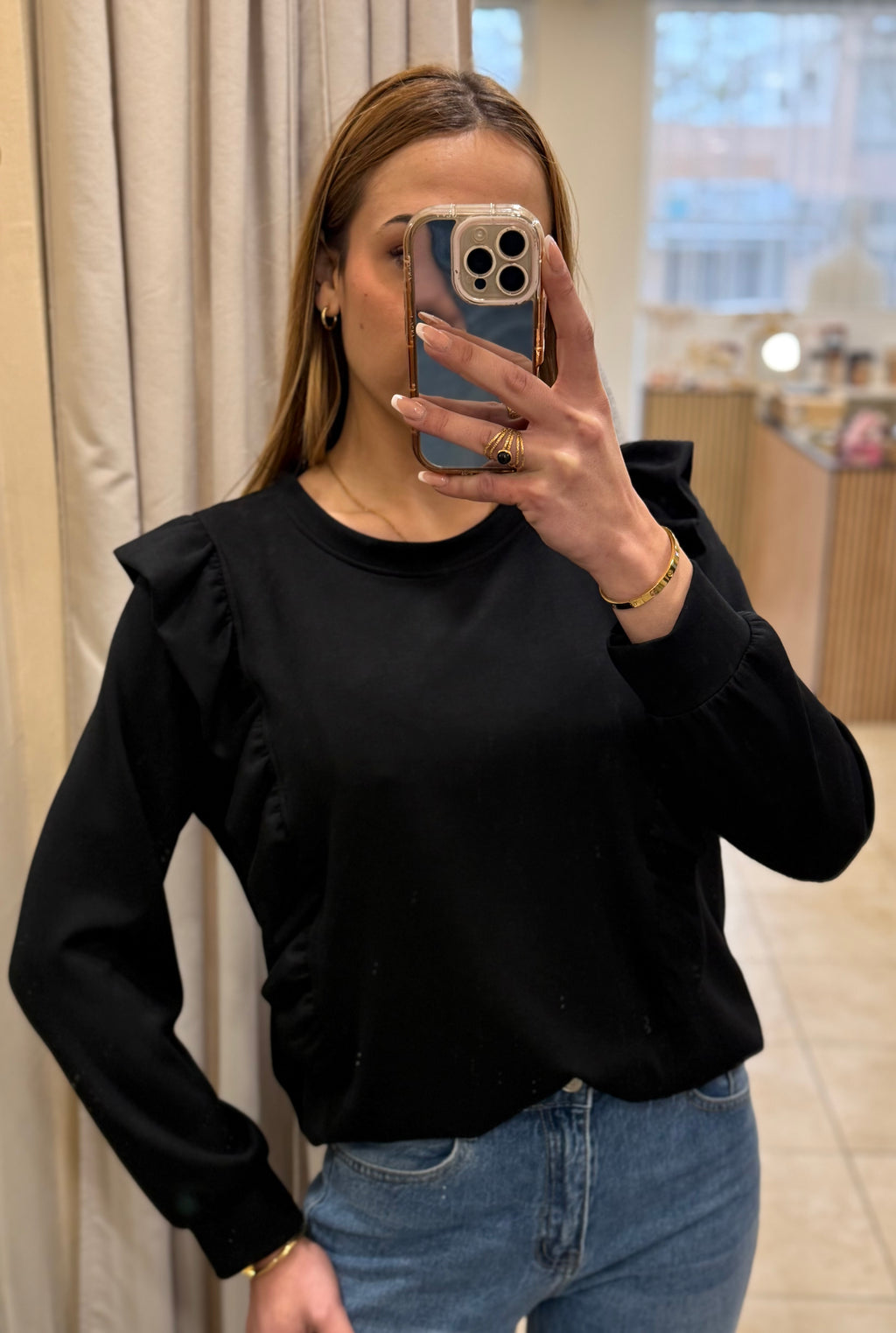 Sudadera volantes